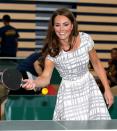 <p>While visiting Bacon's College with Prince William and Prince Harry, Catherine, on July 26, 2012 Kate proved she's still the <a href="https://www.townandcountrymag.com/society/tradition/g31122168/kate-middleton-sports-photos/" rel="nofollow noopener" target="_blank" data-ylk="slk:sportiest royal;elm:context_link;itc:0;sec:content-canvas" class="link ">sportiest royal</a> with a game of ping-pong. </p>