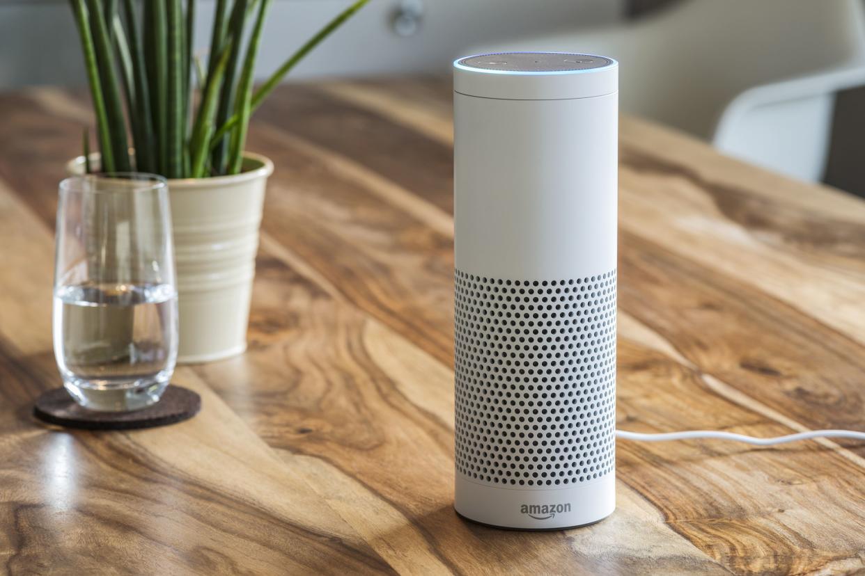 white Amazon Echo Plus on table