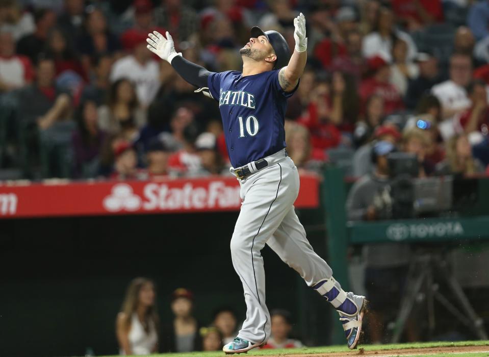 Yonder Alonso celebrates after hitting a solo home run for the Mariners. (Getty)