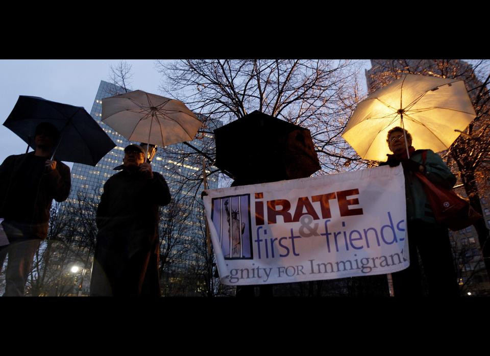 Advocates opposed to a planned New Jersey immigrant detention center gather at Military Park in Newark, N.J., prior to marching to the Essex County Freeholders meeting, Wednesday, Dec. 7, 2011. A contract to enlarge an existing facility was canceled earlier this year after questioned were raised as to why a politically connected company was the sole bidder. (AP Photo/Julio Cortez)