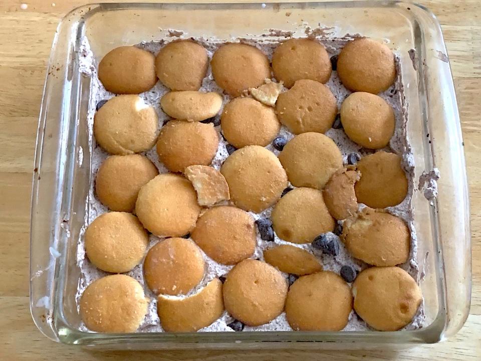 Second layer of Nilla wafers on celebration cake