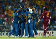 COLOMBO, SRI LANKA - OCTOBER 07: Ajantha Mendis of Sri Lanka celebrates with teammates after dismissing Chris Gayle of the West Indies during the ICC World Twenty20 2012 Final between Sri Lanka and the West Indies at R. Premadasa Stadium on October 7, 2012 in Colombo, Sri Lanka. (Photo by Gareth Copley/Getty Images)