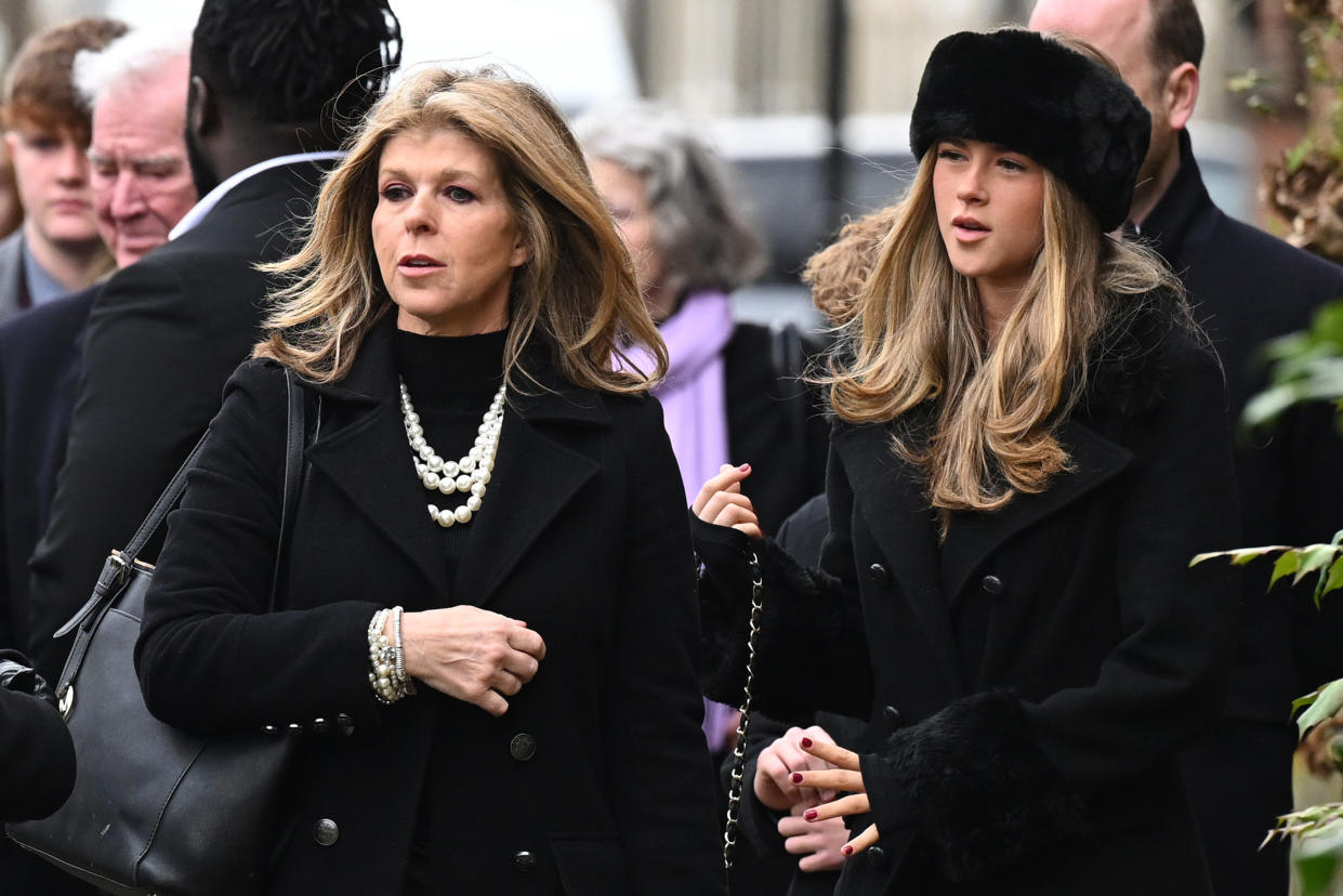 Kate Garraway and daughter Darcey Draper attend the funeral of her husband Derek Draper. 