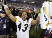 FILE - In this Sunday, Feb. 1, 2009 file photo, Pittsburgh Steelers safety Troy Polamalu celebrates following Pittsburgh's 27-23 win over the Arizona Cardinals in the NFL Super Bowl XLIII football game in Tampa, Fla. Former Pittsburgh Steelers star Troy Polamalu has carved his own unique path to the Hall of Fame. (AP Photo/Amy Sancetta, File)