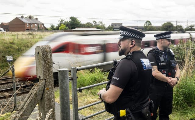 Police officer hit by train