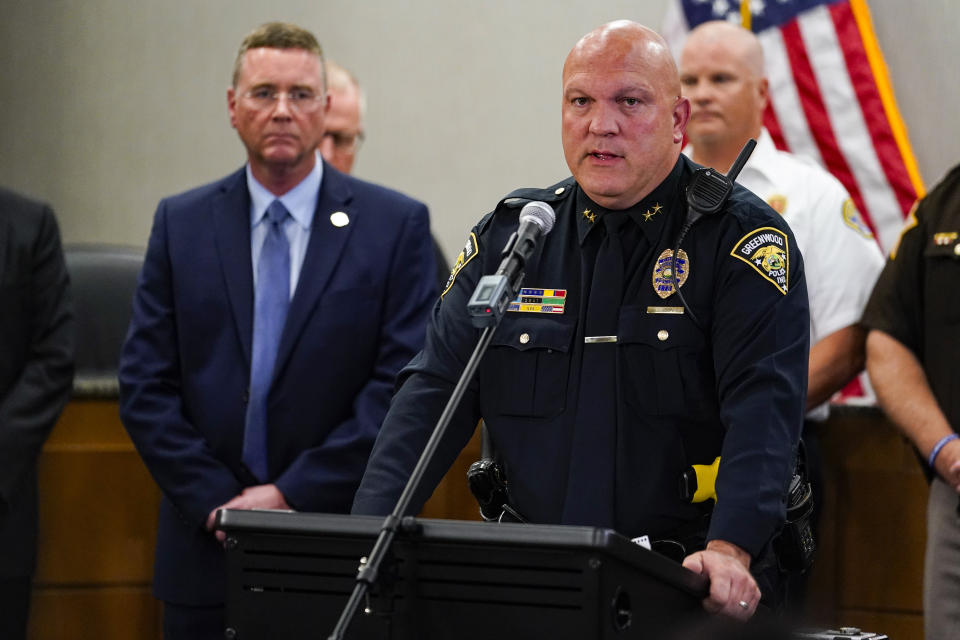 Greenwood Police Chief James Ison speak during a press conference at the Greenwood City Center in Greenwood, Ind., Monday, July 18, 2022. Police say three people were fatally shot and two were injured, including a 12-year-old girl, after Jonathan Douglas Sapirman, 20, opened fire with a rifle in a food court and an armed civilian shot and killed him. (AP Photo/Michael Conroy)