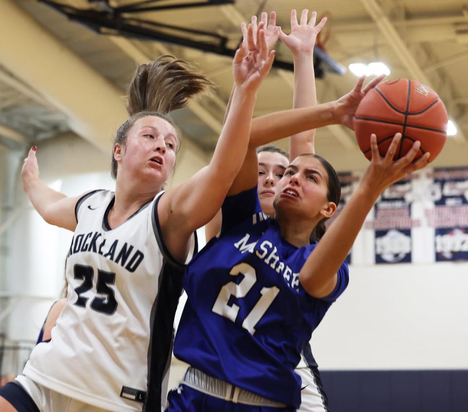 Rockland's Emma Cameron defends Mashpee's Gabriela Santos during a game on Friday, Jan. 6, 2023.