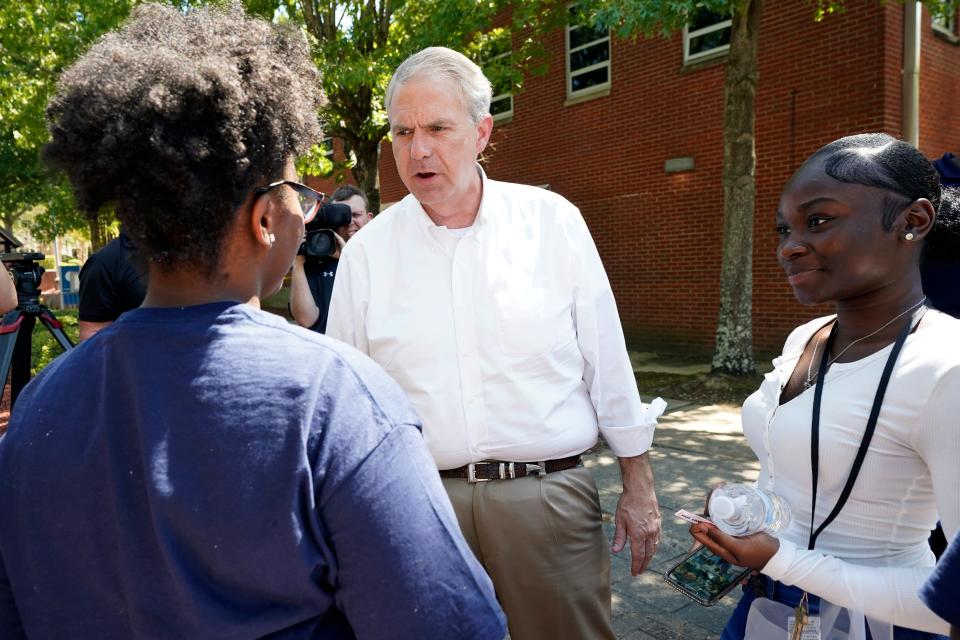 Jackson State University students listen as Democratic candidate for governor Brandon Presley, center, speaks with them during a JSU Votes Civic Engagement Initiative on National Voter Registration Day, Tuesday, Sept. 19, 2023, in Jackson, Miss.