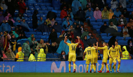 Soccer Football - La Liga Santander - Real Madrid vs Villarreal - Santiago Bernabeu, Madrid, Spain - January 13, 2018 Villarreal's Pablo Fornals celebrates scoring their first goal with teammates REUTERS/Javier Barbancho