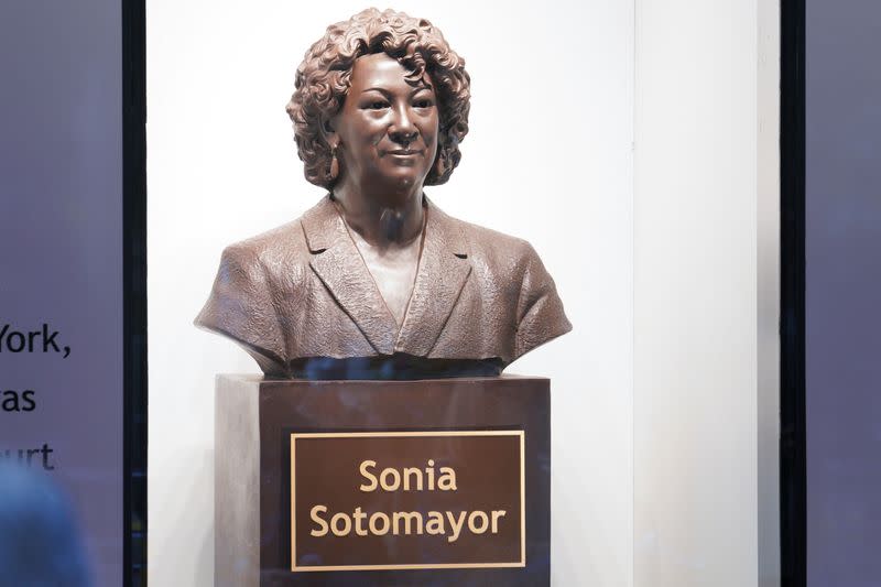 Supreme Court Associate Justice Sonia Sotomayor unveils a bronze bust of herself at the Bronx Terminal Market in New York