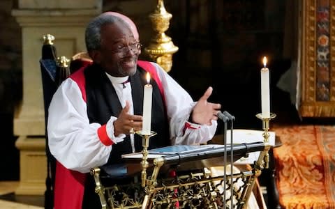 The Most Rev Bishop Michael Curry, primate of the Episcopal Church, gives an address during the wedding of Prince Harry and Meghan Markle in St George's Chapel at Windsor Castle - Credit: Owen Humphreys/PA Wire
