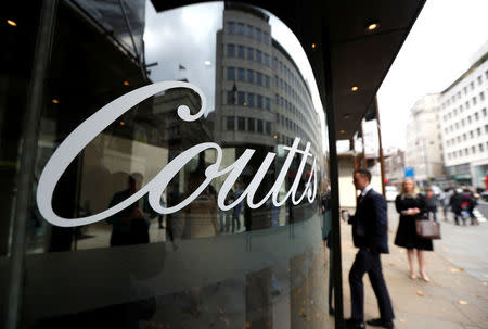 A man walks into Coutts private bank in London, Britain October 10, 2017. REUTERS/Peter Nicholls/Files