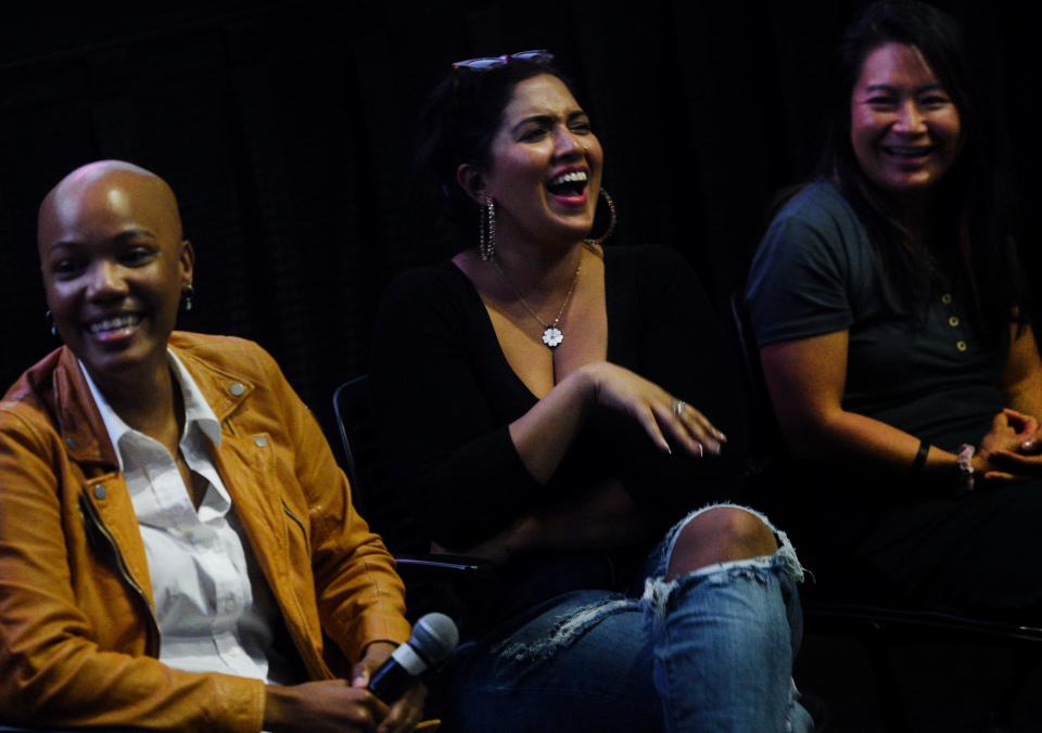Filmmaker Jaya McSharma laughs during the StoryTellHERS event, curated by filmmaker Kristi J. Woodard, featuring the work of local female filmmakers on April 13, 2023, at Robinson Film Center.