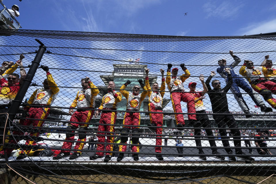 Josef Newgarden's team celebrates winning the Indianapolis 500 auto race at Indianapolis Motor Speedway in Indianapolis, Sunday, May 28, 2023. (AP Photo/AJ Mast)