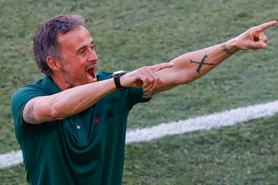 Spain's coach Luis Enrique celebrates his team's second goal during the UEFA EURO 2020 Group E football match between Slovakia and Spain at La Cartuja Stadium in Seville on June 23, 2021. (Photo by Julio MUNOZ / POOL / AFP) (Photo by JULIO MUNOZ/POOL/AFP via Getty Images)