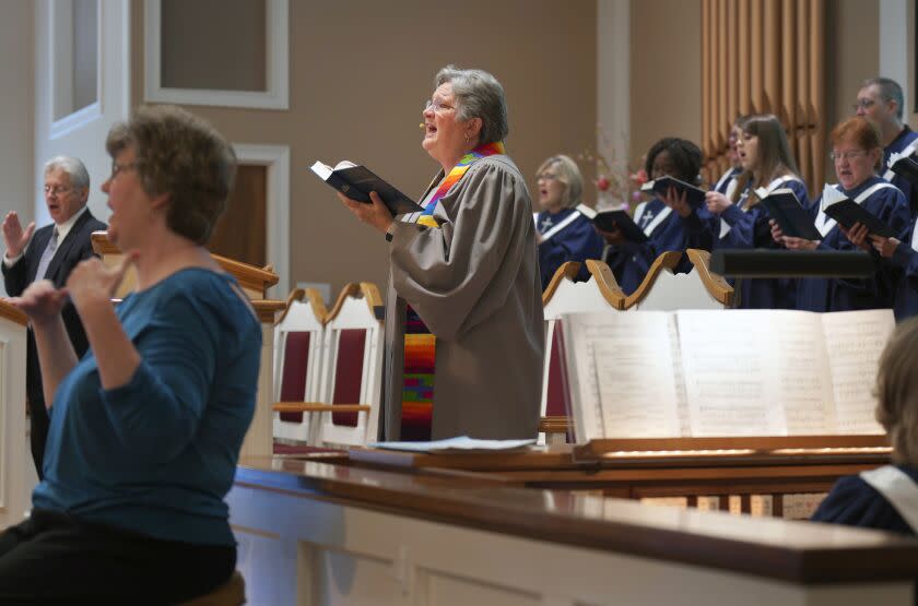 The Rev. Linda Barnes Popham sings with the choir at Fern Creek Baptist Church during a service, Sunday, May 21, 2023, in Louisville, Ky. In February, Fern Creek was one of five churches disfellowshipped from the Southern Baptist Convention because they have female pastors. But Fern Creek Baptist and Saddleback Church of California have decided to appeal. The challenge will be voted on at the upcoming SBC annual meeting. (AP Photo/Jessie Wardarski)