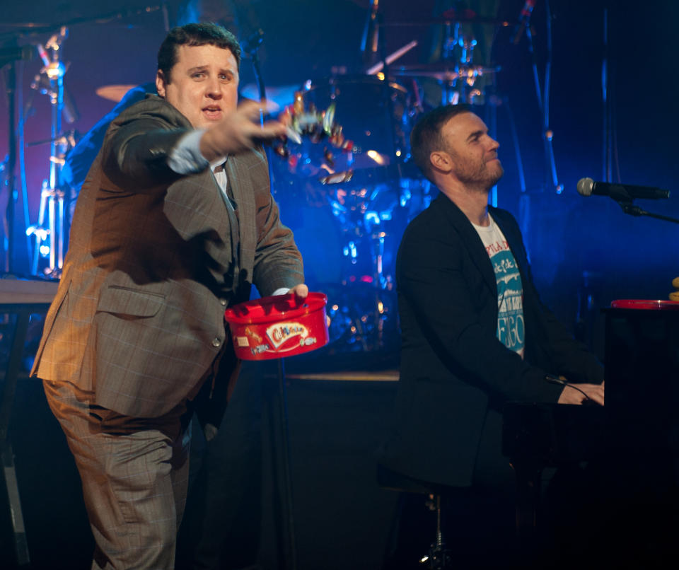 LIVERPOOL, UNITED KINGDOM - DECEMBER 19:  ***EXCLUSIVE ACCESS: PREMIUM RATES APPLY*** Peter Kay and Gary Barlow join Coldplay to perform at charity Crisis' "Hidden Gig" at the Royal Court Theatre on December 19, 2010 in Liverpool, England. (Photo by Nick Pickles/WireImage)