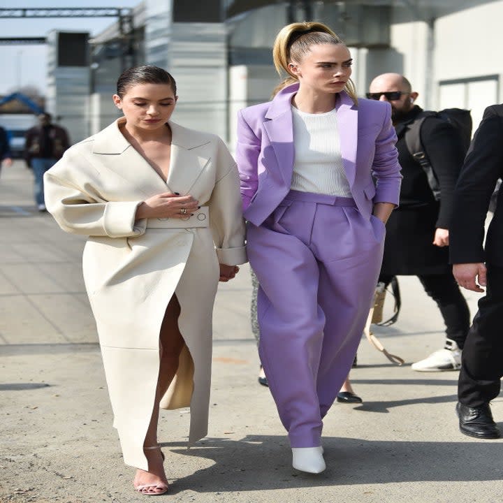 Ashely and Cara holding hands while walking