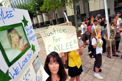 Lori Richards of Daytona Beach, Florida, protests the Casey Anthony verdict in Orlando on July 7. Sentenced to four years in jail for lying to law enforcement, but credited for her good behavior and the time she's already spent behind bars, Anthony is due to be released from prison on July 13. (Photo: Roberto Gonzalez/Getty Images) 