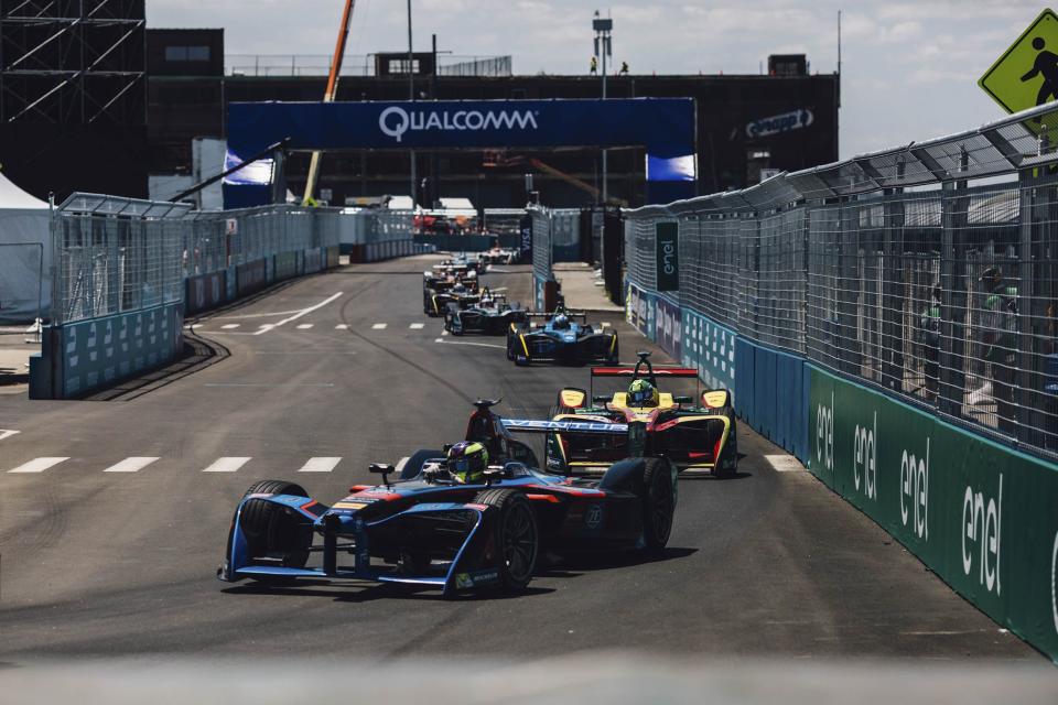 (Bloomberg) -- If you want to know what your car might be like in 2030, and which brands—automotive or otherwise—may be the ones to make it, go watch a Formula E race.The single-seater racing series, now in its fifth season, is like Formula 1—with open-cockpit cars powered by electricity, rather than gas. The next E-Prix will take place on July 13 and 14 in Red Hook in Brooklyn, N.Y. It’s the site of the final two races of the season and the only one this year set in U.S. shores.And it’s a big deal. Audi, BWM, Mercedes-Benz, Mahindra, NIO, Nissan, Virgin, Jaguar, and Porsche are all multimillions-of-dollars-deep into developing their involvement; Nico Rosberg, Qualcomm, and Discovery are investors. They see the racing series as a critical testing ground for technologies on tap for the transportation devices of the future. And such brands as Hugo Boss, Bremont, and Tag Heuer, among others, are hosting parties, conferences, and drive events for press and VIPs throughout the week preceding the races; Harley Davidson is using it as an opportunity to unveil its first-ever electric motorcycle, Project Livewire, to selected media for first-ride reviews.Indeed, Formula E is a celebration of the future of electric autos. It provides stark relief between those companies that can make a viable electric motor and those that can’t. Whereas F1 technologies are so proprietary and secretive that fans need they need a university degree to wade through the distinctions, Formula E teams use the same battery with the same amount of energy; the team that designs the most efficient motor is very likely to win. (That’s with no small effort from one of the welterweight-fit race car drivers, of course.)The stakes are high, if still speculative. Today, battery-powered vehicles account for 1.2% of automotive sales worldwide, but by 2025 their number is expected jump to nearly 11 million vehicles sold, 10 times what it is today. The key for automakers in the meantime is to convince consumers that electric cars are reliable and durable enough to withstand daily, crushing, enthusiastic, and even monotonous use.Tickets to the 2019 New York City E-Prix can be had cheap, at $12. Without the ear-drum-blowing, dangerous decibels of a F1 race, the races presents a family-friendly opportunity to see at thrilling proximity how an emerging sport is gathering speed. (No pun intended.)Plus, while you’re there, you can explore one of New York’s most exciting, fast-developing neighborhoods. (Plus the largest Ikea, complete with Swedish meatballs, you’ve probably ever seen.) Here are our best recommendations for where to eat, drink, and watch during the Formula E races, and even sleep the night before. Where to EatHometown Bar B QueSouthern-style brisket, pork, lamb, and turkey, pit-smoked to pair with traditional sides and craft beers. 454 Van Brunt St.Fort DefianceNeighborhood farm-to-table cooking includes summer squash risotto, Berkshire pork chop, and pan-roasted branzino. Fort Defiance has a full cocktail and oyster bar as well. 365 Van Brunt St.Steve’s Authentic Key Lime PiePies and tarts made by hand from fresh-squeezed lime juice for more than 30 years. The citrus-averse will find a few chocolate concoctions there, too. 185 Van Dyke St.Pizza MotoBrick-oven New York-style pizza, from classics such as Margherita and Pepperoni to Jerzy Pork Store and Vermonter. 338 Hamilton Ave.Grindhaus Local eclectic fare such as Southern-rub roasted chicken, chilled pea soup, and twice-fried chicken wings, plus a full bar. 275 Van Brunt St.Red Hook Lobster PoundSourcing live Maine lobster for six different types of lobster rolls, plus fish ’n’ chips, hot crab dip, and a succulent shareable lobster for two, among other crowd favorites. 284 Van Brunt St. Where to Sleep1 Hotel BrooklynSet on Pier 1 of Brooklyn Bridge Park, with stunning views of the Manhattan skyline, a full restaurant, and multiple bars. The rooms incorporate reclaimed woods, industrial steel, and custom organic-cotton elements by Keetsa. 60 Furman St., Brooklyn HeightsThe William ValeAt Williamsburg’s newest hotel, with a stunning roof deck and pool, sunset drinks are a must. All of the slick, minimal rooms have floor-to-ceiling windows and deck balconies. The ground floor Southern Italian-style restaurant is operated by chef Andrew Carmellini of the Dutch, Locanda Verde, and Bar Primi. 111 N. 12th St., WilliamsburgThe Ludlow HotelAn option in Manhattan’s Lower East Side that’s close enough to be accessible to Red Hook while you keep a foot in the center of it all. Slightly more undercover than its Bowery Hotel sister property, with studios, terraces, lofts, and a penthouse on offer. Its restaurant, Dirty French, is a perpetual scene. 180 Ludlow St., Manhattan Where to DrinkDive BarsSunny’s Red HookDefinitive Brooklyn dive; you’ll know it by the old truck parked out front. 253 Conover St.Brooklyn Ice HouseCasual, outdoor seating with simple burgers to match the PBR and onion rings. 318 Van Brunt St.Van Brunt Still HouseA small-batch distillery with a roughed-up, cool tasting room and selections such as spicy rye whiskey, smoky corn whiskey, and smooth wheated bourbon. 6 Bay St.Cocktails With a ViewThe William ValeHead to the rooftop for Instagram-worthy cocktails at sunset. 111 N. 12th St., Williamsburg1 Hotel BrooklynThe best hotel views of Manhattan while closest to the race course. 60 Furman St., Brooklyn HeightsBrooklyn CrabAround the corner from Sunny’s. If you stretch, you can see the Statue of Liberty from the roof deck—and play lawn games, while you’re at it. 24 Reed St.Ceconis x Dumbo HouseSoho House’s Brooklyn location offers Old-Fashioned cocktails and water views on the East River. 55 Water St. Formula E Rules to KnowFormula E is like Formula One but with cars powered by electric batteries, rather than conventional engines. This season, 22 drivers from 11 teams are racing to win the top spot by the end of the series, which has taken them to such locales as Santiago, Hong Kong, Paris, Monaco, Rome, and Marrakesh, Morocco.The official ABB FIA Formula E Championship includes two separate titles, one for the winning driver and one for the winning team. The driver championship goes to whoever earns the most points over the eight-month season. The team championship goes to the team with the highest combined scores of its two drivers over the season. This season, Frenchman Jean-Éric Vergne is currently in first place among the drivers, and China’s DS Techeetah leads the team rankings.Drivers earn points by finishing well in each race, with 25 points awarded to the race winner, 18 points to the runner-up, 15 points for a third-place finish, and so forth. Tenth place earns one point, after which no points are awarded. The driver who is at pole position earns an additional three points, while the driver who sets the fastest lap and finishes in the top 10 gets an additional one.The drivers have two ways to get more power for their cars during a race—and these launch it squarely into live-action video game territory, unlike the analog Formula One. The first one is called Attack Mode. To do this, drivers leave the racing line and drive through a slower lane in the “activation zone.” If they do this, they get an extra 25 kW of power unlocked on the powertrain, which they can use to help them speed through the next few laps. Or they can win the “Fan Boost” power surge, which is determined by fan voting. This awards the driver a 25 kW power boost during a five-second window in the second half of a race. Fans can vote for favorite drivers online or live on Twitter by using the hashtag of the name of their chosen driver along with FANBOOST.It is forbidden to use more than four new rear and four new front tires during each racing weekend, from shakedown through the end of the race. If for some reason, a team burns through its allotted supply of tires, it’s out of the race. All teams must use special, bespoke, 18-inch, all-weather Michelin tires.No charging of any car is allowed during qualifying rounds and the E-Prix, but teams can charge their cars between sessions and during practice. Cars are charged on generators powered by glycerine, a zero-emission bio-diesel byproduct; it takes one hour to fully charge. Only one car is used per driver per race. The Race ScheduleFridays are typically for shakedowns, when drivers and teams get to know the track and evaluate the technology and mechanics of their cars.Each race weekend involves practice sessions—one 45 minutes long and one 30 minutes long—on the first track day, as well as one on the second track day. The time keepers are engaged during the practice sessions, but the results don’t count toward final standings.Qualifying rounds happen before each day’s main events on Saturday and Sunday. They determine the order in which each driver will start the race. They’re run in groups of up to six cars, so there’s a little more room to maneuver on the track. Each group posts its fastest lap, and the fastest six times go on to compete in a “super pole” shootout wherein drivers compete one-by-one for pole position. The driver with the fastest qualifying time gets the first-place start, and the driver with the slowest time starts at the back. Qualifying sessions last one hour.The race itself is called the “E-Prix.” It lasts 45 minutes, plus one lap. Once the leader has crossed the finish line after 45 minutes of racing, everyone does one more lap before the race is officially over. The CarThis season will see new cars racing around 12 cities. (Previous model cars are now on sale to collectors.) The 2019 car has a battery with capacity nearly double that of its predecessor; it will debut in New York with 250 kW of power (equal to 335 bhp) and can accelerate from zero to 62 mph in 2.8 seconds. Top speed is 280 kilometers per hour (174 mph).The minimum weight of the car and driver together is 900 kilograms (1,984 pounds). (The battery alone weighs 385 kg, or 849 pounds.) Each car is 5,160 millimeters long and 1,770 mm wide, or about 17 feet long and nearly six feet wide.The halo ring around the top of the cockpit on the new cars is there for protection in the event of a crash. It also has an LED strip that flashes blue, when the driver is in Attack Mode, and magenta, when a driver is using Fanboost. The CourseThe 1.5-mile track runs along the historic Brooklyn Cruise Terminal, deep in Brooklyn’s Red Hook section. Because of its 14 corners, it is considered the toughest in the series for all 22 cars and drivers. There will be grandstands, paddocks, entertainment areas, and VIP lounges for ticket holders and attendees.The CrashesInevitably, cars will collide. Usually, the impact isn’t severe; as the old saying goes, if you’re not rubbing, you’re not racing. But when bad collisions happen, the halo ring that sits above the cockpit will protects drivers from the force of 14 cars stacked on top of their vehicle. Here is a compilation of the most dramatic crashes of the season so far. Drivers to WatchJean-Éric VergneThe Frenchman won last year’s championship, clinching the title after the New York E-Prix in 2018. Vergne competed in Formula One for Scuderia Toro Rosso from 2012 to 2014 and was a Ferrari test and development driver from 2015 to 2016. In the standings this year driving for Techeetah, he is currently in first place.Lucas Di Grassi The Brazilian racer drives for Audi’s Formula E team. He won the Formula E championship title in the 2016/2017 season; this year he’s currently in second place.Mitch Evans The Kiwi won his first-ever Formula E race in Rome this year, driving for Panasonic Jaguar Racing. He’s currently in third place.André LottererThe German racer is the second driver for Techeetah, currently in fourth place and helping boost the team to an all-around top post so far in the series. He is famous for his three wins at the 24 Hours of Le Mans, driving for Audi, and for winning the World Endurance championship in 2012. Teams to WatchDS TecheetahThe Chinese motor racing team is currently leading the team standings under team principal Mark Preston. Its two drivers hold the first and fourth positions going into July’s races.Audi Sport ABT Schaeffler Germany’s Audi Sport ABT Schaeffler was one of the founding members of the Formula E racing series. The team principal is Allan McNish, who has led the team to its current second-place standing.Envision Virgin Racing The British racing team is majority-owned by Envision Energy, with Sylvain Filippi as principal. A founding member of the Formula E series, it currently sits in third place in the overall standings.BMW i Andretti MotorsportAt No. 6, BMW i Andretti racing is the top-ranked team with a U.S. affiliation. It sits in the Andretti Autosport conglomerate owned and operated by former driving champion Michael Andretti. How to Get ThereBy Shuttle — Free shuttles to the track leave from Carroll Gardens and from the Atlantic Terminal near Barclays Center every half hour.By Subway — The Carroll Street Station stop on the F Line is a 15-minute walk to the track.By Car — Street parking will be a challenge, so plan to park in an outdoor lot, pay with cash, and walk to the event. Better yet, go by taxi or car service.By Citi Bike — You can pick them up all over Brooklyn and in Manhattan’s Lower East Side. If you get one in Manhattan, ride over the Brooklyn Bridge for beautiful views. Allow an hour or so for the ride, but remember to dock the bike/re-check it out every 30 minutes, or risk a fee. Don’t Forget to BringTickets — Prices start at $12 and reach $390 for two-day lounge passes.Sunscreen — There will be indoor lounges and covered areas and seating, but the grandstand seats lie under direct sunlight. Plan ahead to protect your skin.Ear Plugs — Formula E has nowhere near the sound level of Formula 1, which can reach 140 decibels during a race. But at a top level of 80 decibels, Formula E still merits some ear protection.To contact the author of this story: Hannah Elliott in New York at helliott8@bloomberg.netTo contact the editor responsible for this story: Justin Ocean at jocean1@bloomberg.netFor more articles like this, please visit us at bloomberg.com©2019 Bloomberg L.P.