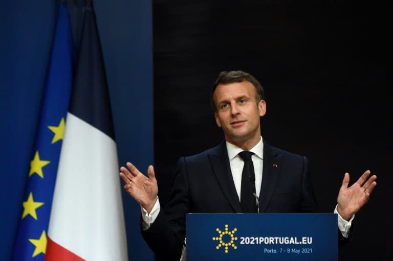 Le président français Emmanuel Macron en conférence de presse, lors du sommet social des 27, le 8 mai 2021 à Porto, au Portugal - MIGUEL RIOPA © 2019 AFP