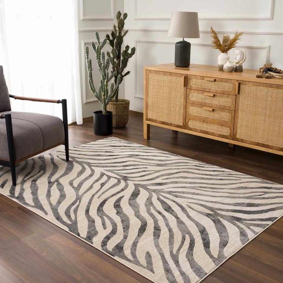 <p><a href="https://go.redirectingat.com?id=74968X1596630&url=https%3A%2F%2Fboutiquerugs.com%2Fproducts%2Fecorse-area-rug&sref=https%3A%2F%2Fwww.elle.com%2Ffashion%2Fshopping%2Fg46649590%2Fbest-area-rugs%2F" rel="nofollow noopener" target="_blank" data-ylk="slk:Shop Now;elm:context_link;itc:0;sec:content-canvas" class="link ">Shop Now</a></p><p>Gray Ecorse Zebra Print Area Rug</p><p>boutiquerugs.com</p><p>$39.00</p>