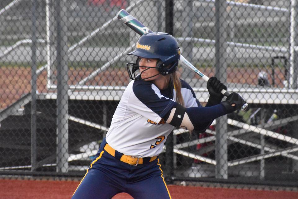 Mooresville's Alex Cooper swings at a pitch that went for a homerun during the Pioneers' rivalry matchup with Martinsville on April 5, 2022.