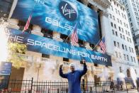 Sir Richard Branson poses outside of the New York Stock Exchange (NYSE) ahead of Virgin Galactic (SPCE) trading in New York