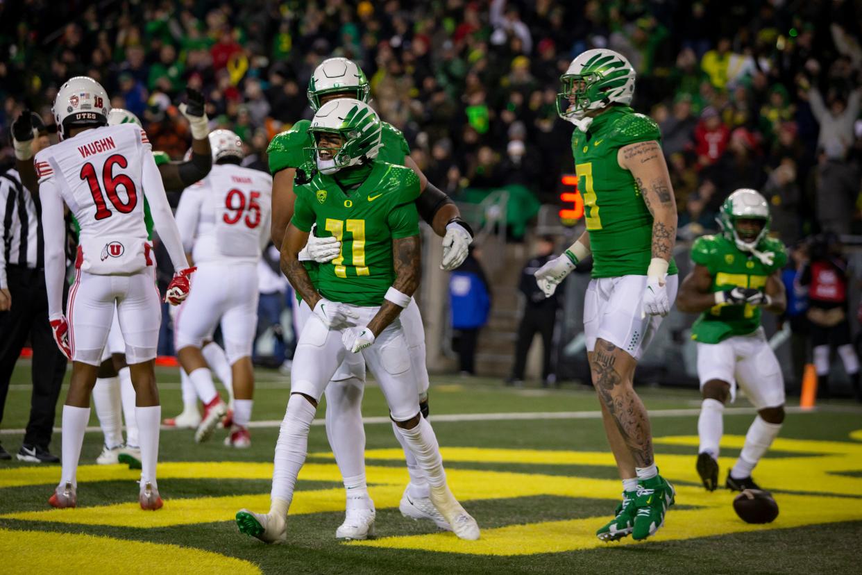 Oregon wide receiver Troy Franklin celebrates a touchdown as the No. 12 Oregon Ducks host the No. 10 Utah Utes in Oregon’s final home game of the season at Autzen Stadium in Eugene, Ore. Saturday, Nov. 19, 2022. 