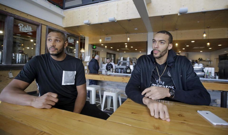 Ini this Jan. 12, 2017 photo, Utah Jazz's Boris Diaw, left, and Rudy Gobert look on during an interview, in Salt Lake City. Diaw and Gobert have known each other for years and were members of the French national team in the Rio Olympics. Their comfort level is a significant reason the Jazz are in the thick of the playoff race heading down the stretch after the All-Star break. (AP Photo/Rick Bowmer)