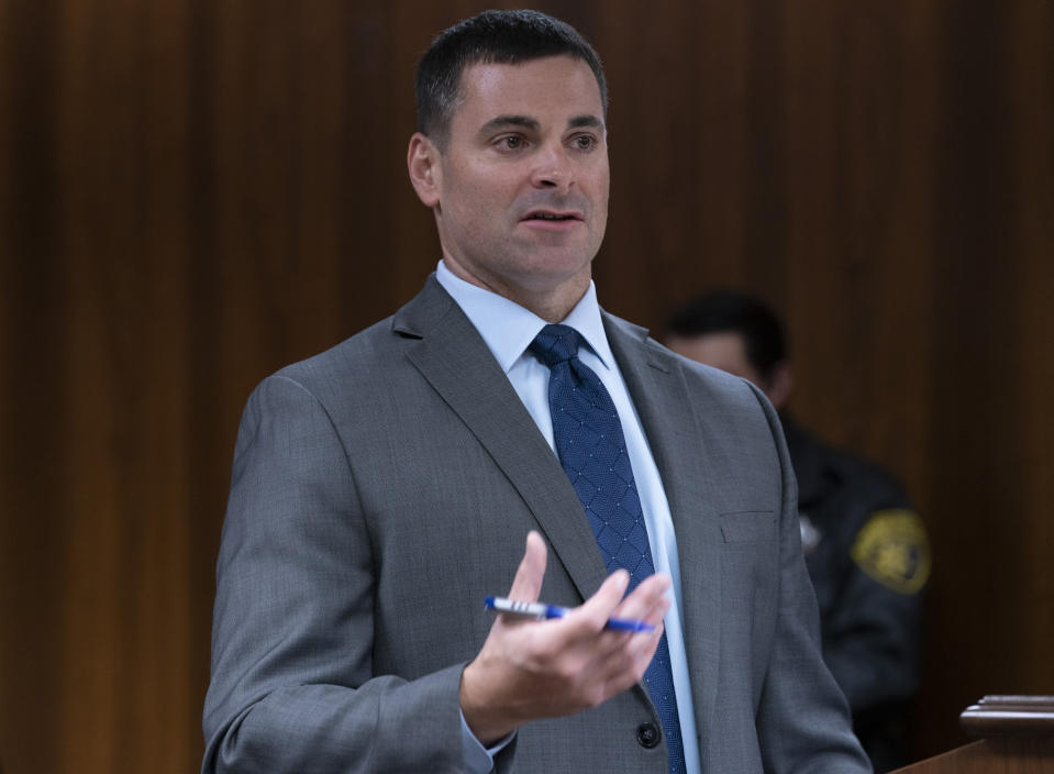 Assistant Oakland County Prosecutor Marc Keast, questions witness forensic psychiatrist Dr. Lisa Anacker about Ethan Crumbley at the Oakland County Courtroom of Kwame Rowe, on Friday, Aug. 18, 2023, in Pontiac, Mich. The judge will hear a fourth and final day of testimony Friday to determine whether Crumbley will get a life sentence for the fatal shooting of four students at a Michigan school in 2021. (Mandi Wright/Detroit Free Press via AP, Pool)