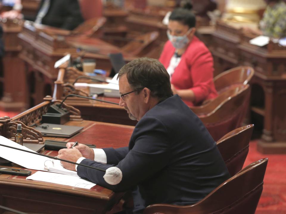 State Sen. Brian Dahle, R-Bieber, a member of the Senate Budget and Fiscal Review Committee, goes without a face mask during a budget committee hearing held in the Senate Chambers in Sacramento on May 28, 2020.