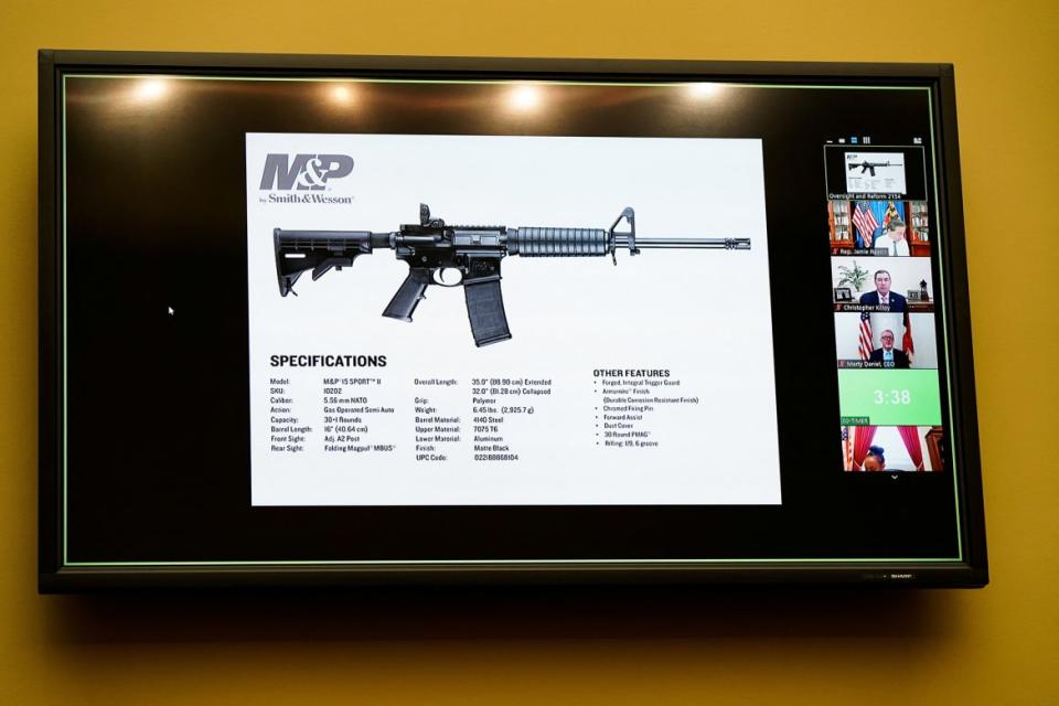 <div class="inline-image__caption"><p>A Smith & Wesson semi automatic firearm is seen on a screen during the July 27 House Oversight hearing.</p></div> <div class="inline-image__credit">Elizabeth Frantz/Reuters</div>