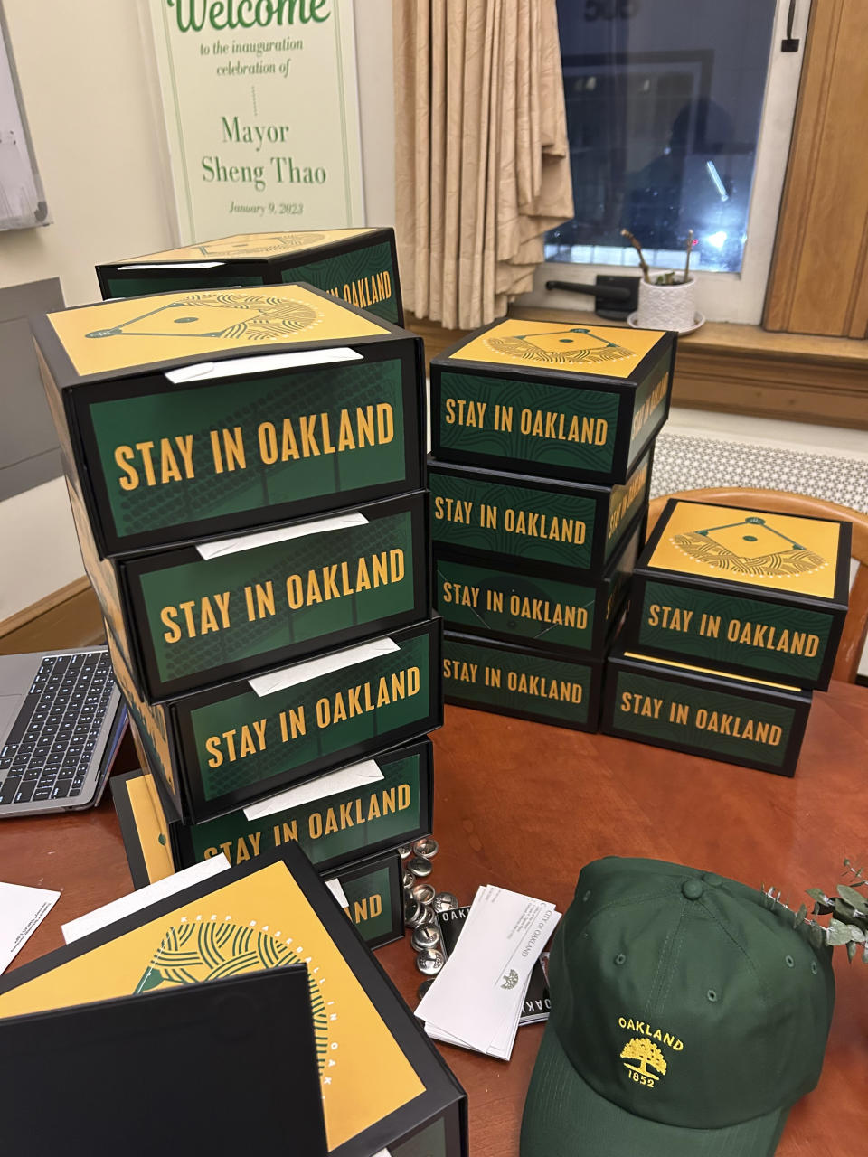 In this photo provided by Stephen Lucero, a stack of assembled boxes being sent to a select 15 owners from the mayor's office in an effort to sway next week's vote at the Major League Baseball owners meetings to keep the Oakland Athletics in Oakland, Calif., is displayed Tuesday Nov. 7, 2023. (Stephen Lucero via AP)