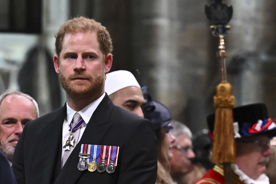 FILE -Britain's Prince Harry, Duke of Sussex looks on as Britain's King Charles III leaves Westminster Abbey after coronation in central London Saturday, May 6, 2023. (Ben Stansall/Pool photo via AP, FIle)