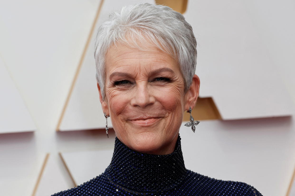 Jamie Lee Curtis wearing Stella McCartney poses on the red carpet during the Oscars arrivals at the 94th Academy Awards in Hollywood, Los Angeles, California, U.S., March 27, 2022. REUTERS/Eric Gaillard