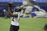 Baltimore Ravens wide receiver Rashod Bateman catches a pass during NFL football training camp Saturday, July 31, 2021, in Baltimore. (AP Photo/Gail Burton)