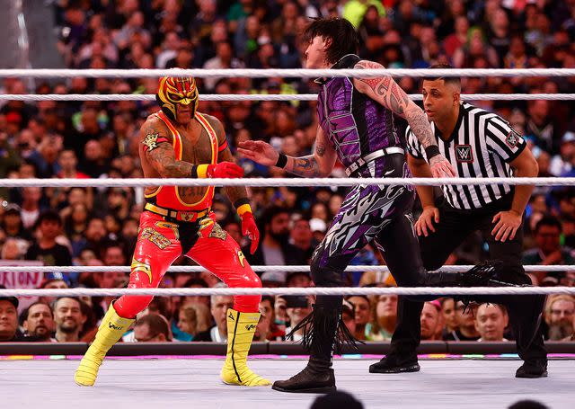 <p>Ronald Martinez/Getty</p> Dominik Mysterio wrestles Rey Mysterio during WrestleMania Goes Hollywood on April 01, 2023 in Inglewood, California.