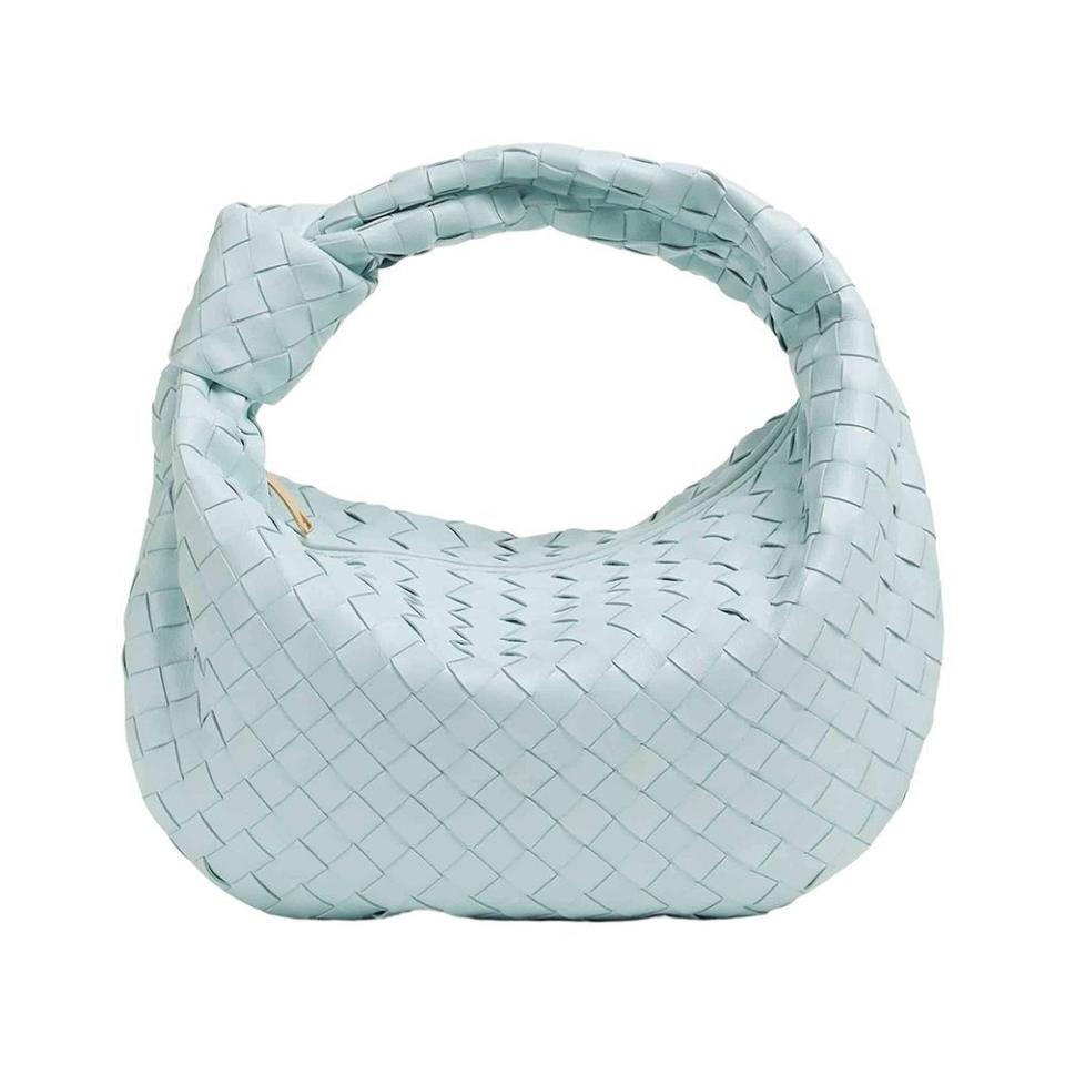 <p><a href="https://go.redirectingat.com?id=74968X1596630&url=https%3A%2F%2Fstockx.com%2Fbottega-veneta-jodie-teen-teal-washed&sref=https%3A%2F%2F" rel="nofollow noopener" target="_blank" data-ylk="slk:Shop Now;elm:context_link;itc:0;sec:content-canvas" class="link ">Shop Now</a></p><p>Jodie Teen Teal Washed</p><p>stockx.com</p><p>$1437.00</p>