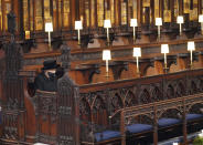 Britain's Queen Elizabeth II sits alone in St. George’s Chapel during the funeral of Prince Philip, the man who had been by her side for 73 years, at Windsor Castle, Windsor, England, Saturday April 17, 2021. Prince Philip died April 9 at the age of 99 after 73 years of marriage to Britain's Queen Elizabeth II. (Jonathan Brady/Pool via AP)