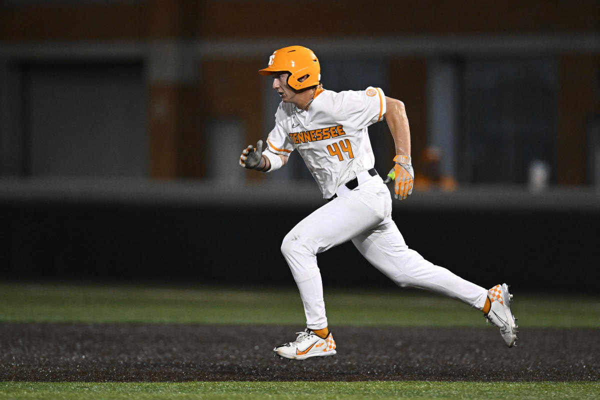 Zane Denton of the Tennessee Volunteers runs the bases after hitting  News Photo - Getty Images