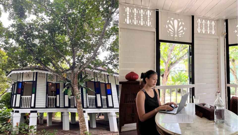 The writer working on an article at the verandah area of the Negeri Sembilan house at Temple Tree Resort Langkawi. (PHOTO: Reta Lee/Yahoo Life Singapore)