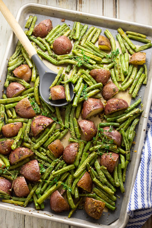 <p>The Gracious Wife</p><p>Buttery, crispy red potatoes and fresh green beans tossed with garlic and herbs make a simple, elegant, and flavorful side dish for any meal.</p><p><strong>Get the recipe: <a href="https://www.thegraciouswife.com/herb-roasted-potatoes-green-beans-thanksgiving-side-dish-recipe/" rel="nofollow noopener" target="_blank" data-ylk="slk:Garlic Herb Roasted Potatoes and Green Beans;elm:context_link;itc:0;sec:content-canvas" class="link ">Garlic Herb Roasted Potatoes and Green Beans</a></strong></p><p><strong>Related: <a href="https://www.yahoo.com/lifestyle/green-bean-casserole-green-beans-141937705.html" data-ylk="slk:24 Best Green Bean Recipes;elm:context_link;itc:0;sec:content-canvas;outcm:mb_qualified_link;_E:mb_qualified_link;ct:story;" class="link  yahoo-link">24 Best Green Bean Recipes</a></strong></p>