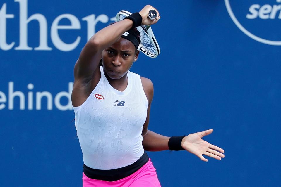 Coco Gauff plays a backhand during her match against Naomi Osaka at the Western & Southern Open.