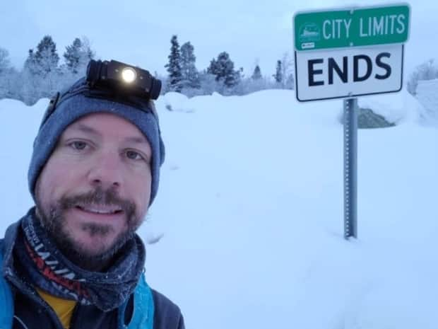 Pushing it to the city limits: Phelps takes a cold selfie at the edge of Whitehorse.