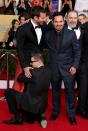 <p>The actor seemed to laugh off this fan's ambush at the 2014 SAG Awards—before security pried the man from his legs, that is. Turns out, it was notorious Ukrainian prankster Vitalii Sediuk. </p>