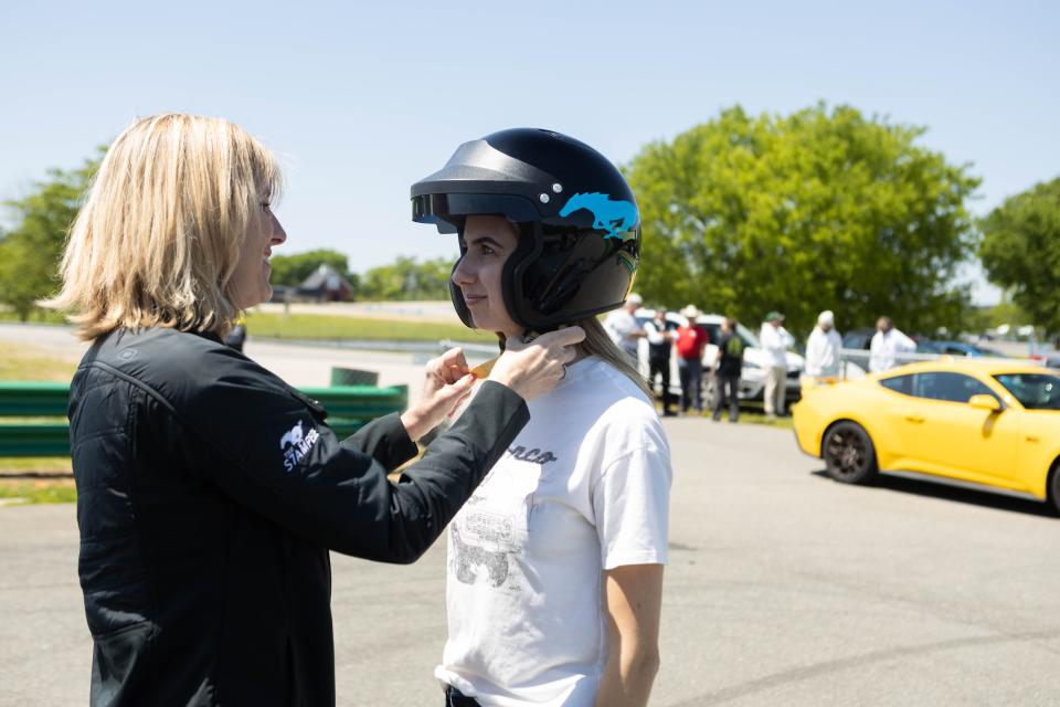 Laurie Transou, chief engineer of the Mustang program, with her daughter Claire Wojan, both of Northville, drove the Virginia International Raceway in Alton on April 24, 2023.