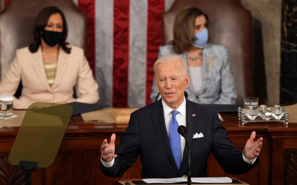 US President Joe Biden speaks to a joint session of Congress as Vice President Kamala Harris and House Speaker Nancy Pelosi stand behind him at the Capitol  - Doug Mills/POOL/EPA-EFE/Shutterstock