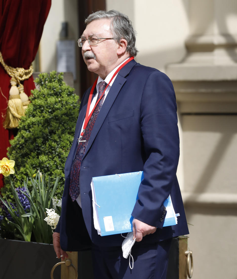 Russia's Governor to the International Atomic Energy Agency (IAEA), Mikhail Ulyanov stands outside of the 'Grand Hotel Wien' where closed-door nuclear talks with Iran take place in in Vienna, Austria, Tuesday, April 27, 2021. (AP Photo/Lisa Leutner)