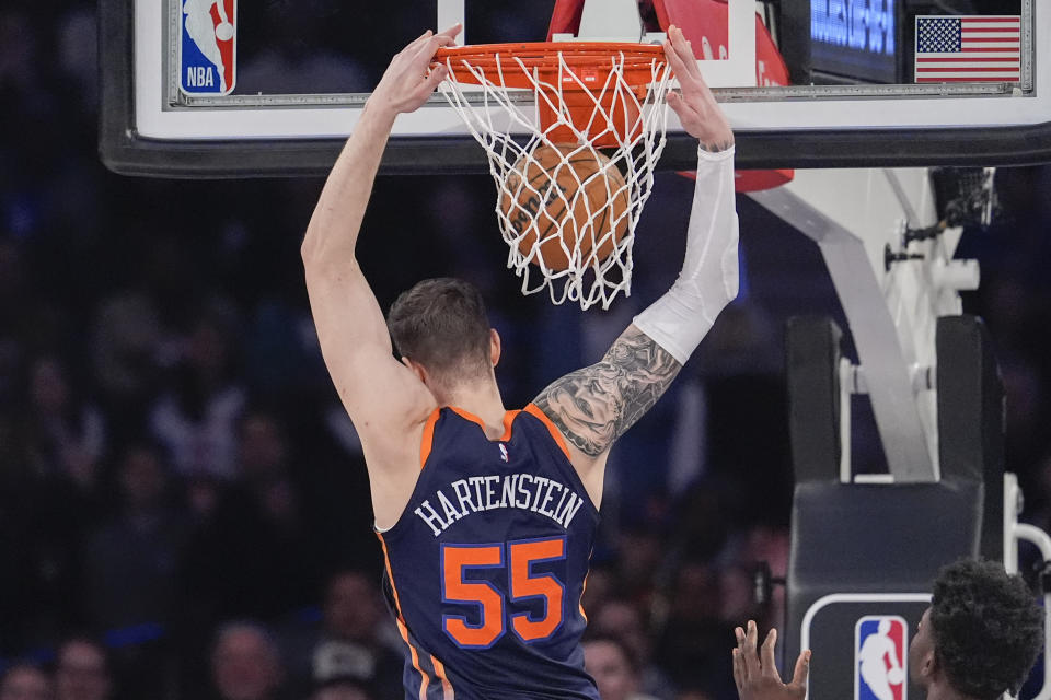 New York Knicks center Isaiah Hartenstein dunks against the Philadelphia 76ers during the first half of an NBA basketball game Tuesday, March 12, 2024, at Madison Square Garden in New York. (AP Photo/Mary Altaffer)